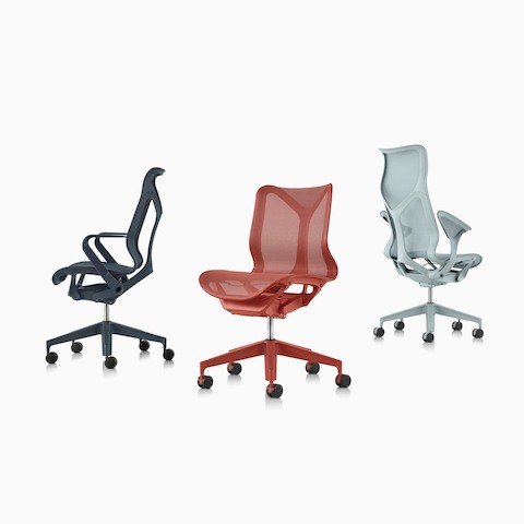 A grouping of Nightfall navy blue, Canyon red, and Glacier light blue Cosm Chairs.