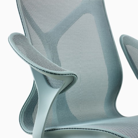 A mid-back Cosm Chair with leaf arms and Glacier light blue frame and suspension material.