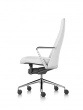 Profile view of a white leather Taper executive chair.