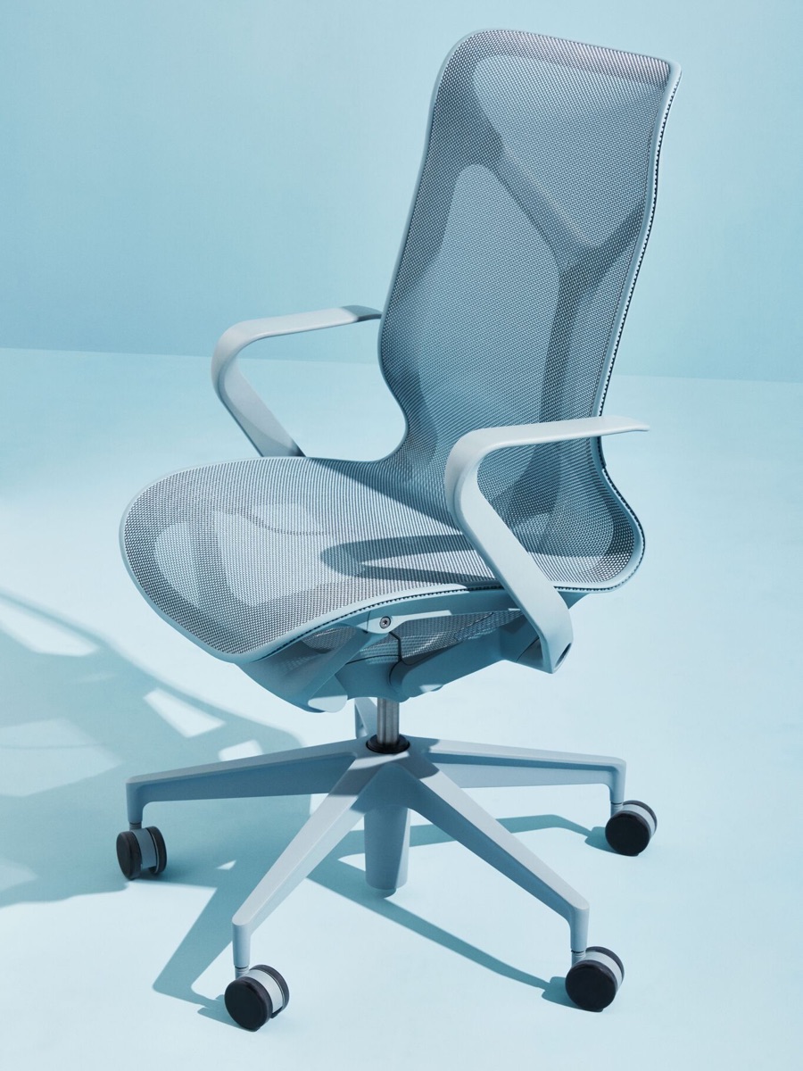 A Glacier light blue mid-back Cosm Chair on a light blue background.