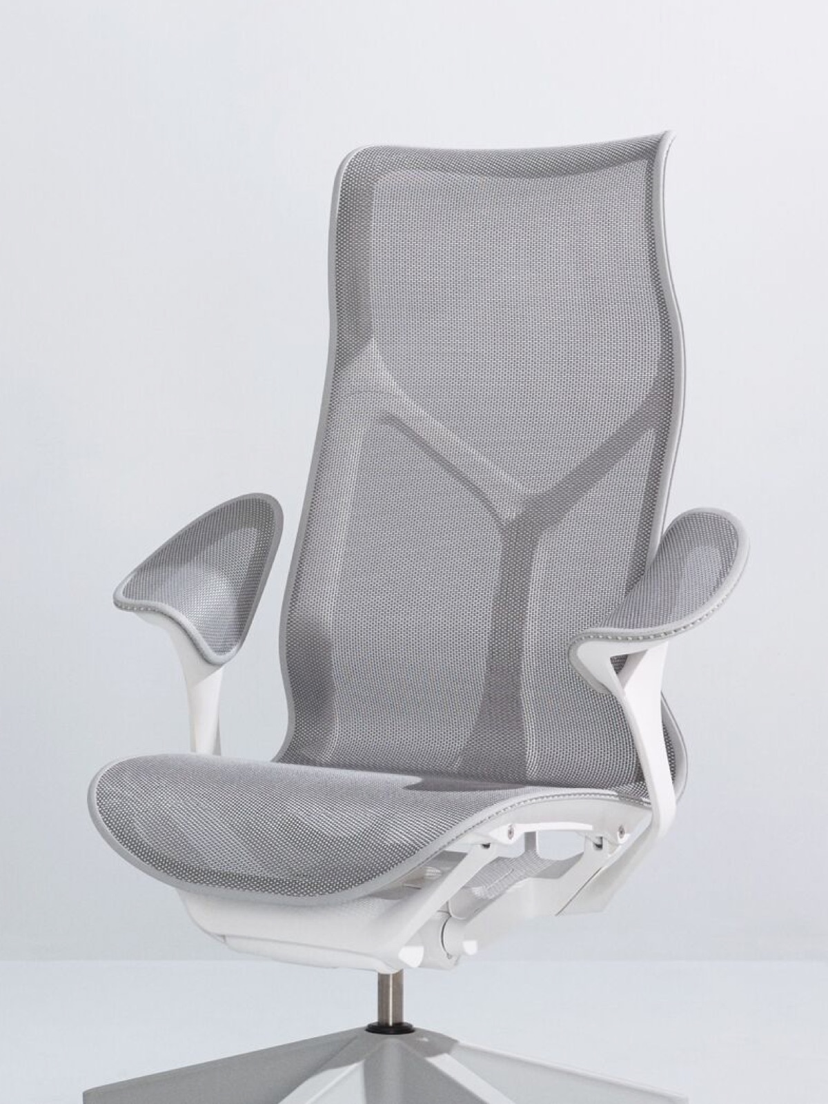 A Mineral grey high-back Cosm Chair with a white frame and leaf arms on a light grey background.